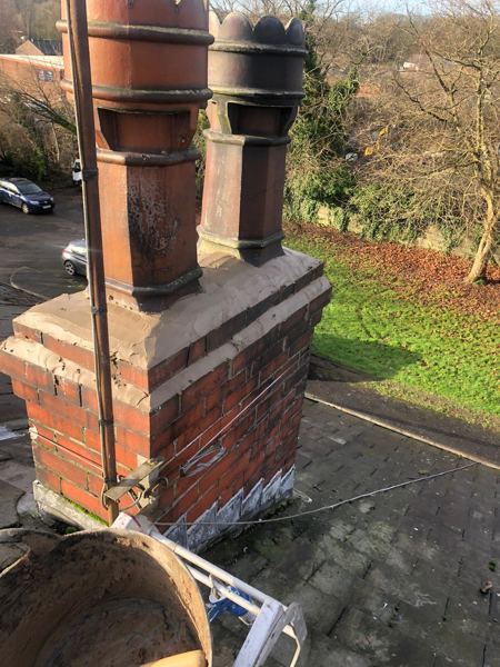Twin decorative pots on a Chester stack with new flaunching and pointing