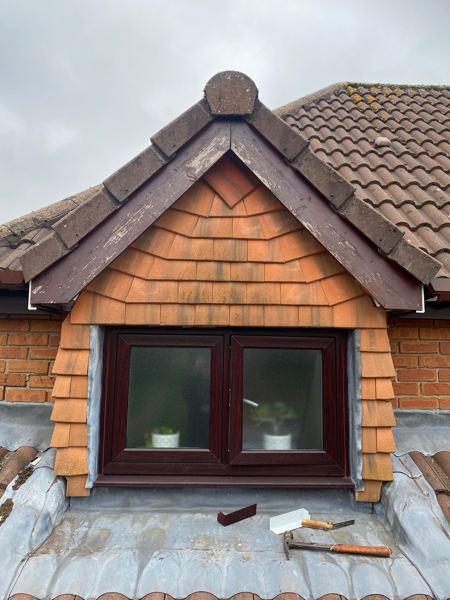 Dormer gable before, old timber bargeboards with badly flaking paint